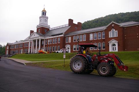 Student farmer: Tyler Hymers drives his tractor past the high school.